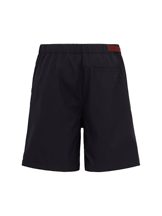 OUTHERE: Reve tech Bermuda shorts