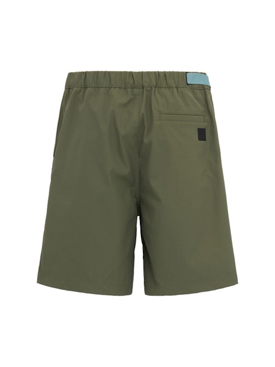 OUTHERE: Reve tech Bermuda shorts