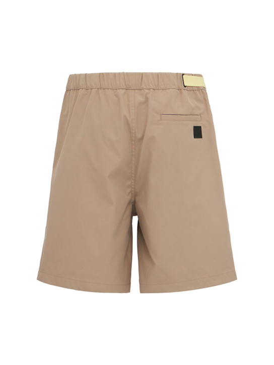 OUTHERE: Reve tech Bermuda shorts