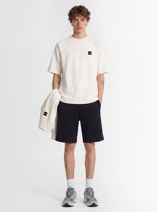 OUTHERE: Awake cotton blend Bermuda shorts