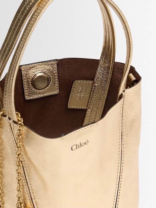 Chloé: Spin metallic leather top handle bag