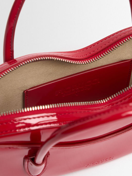 FIORUCCI: Mini Lips vinyl top handle bag