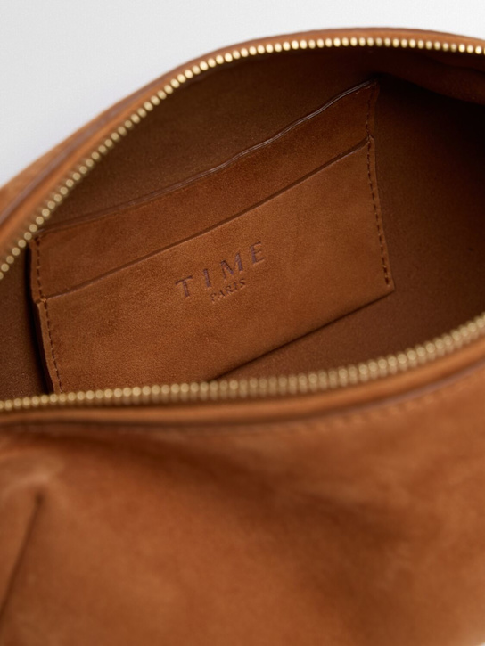 TIME: Elongated suede shoulder bag