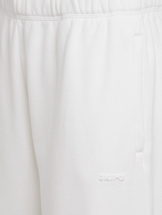 SKIMS: Classic straight leg pants