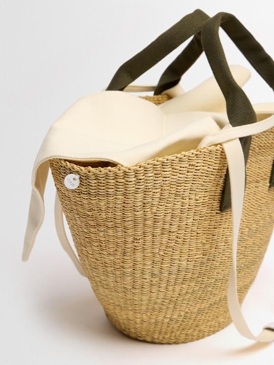 MUUÑ: Abou raffia effect top handle bag
