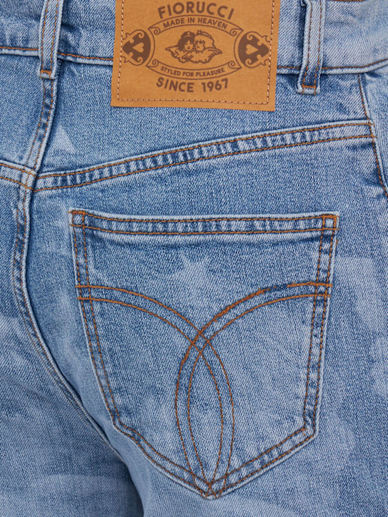 FIORUCCI: Angel print flared skinny jeans