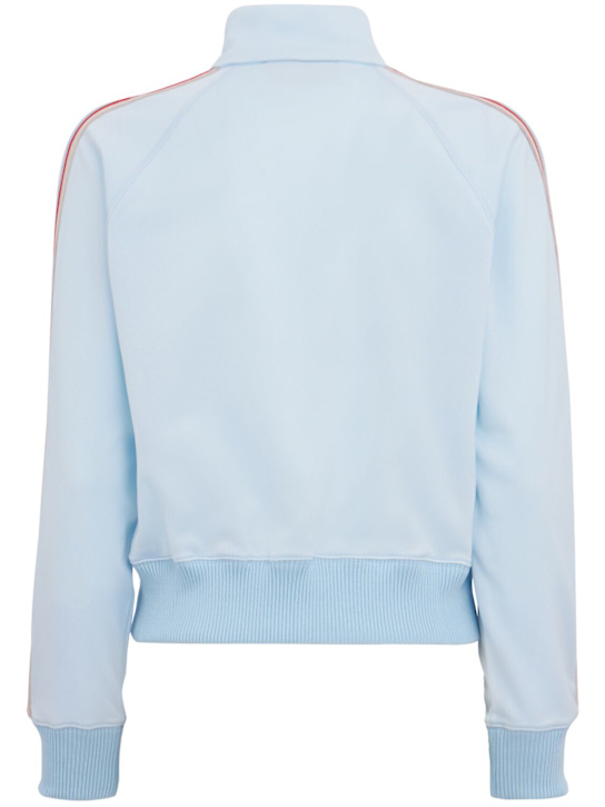 FIORUCCI: Angel patch cropped track jacket