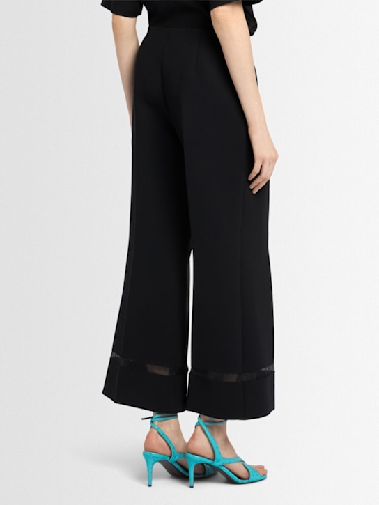 Khaite: Wallace flared poly pants