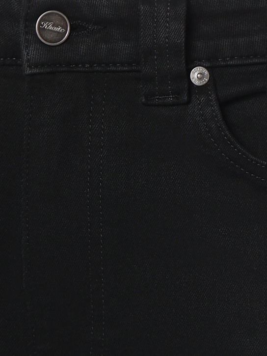 Khaite: Dane denim mid rise jeans