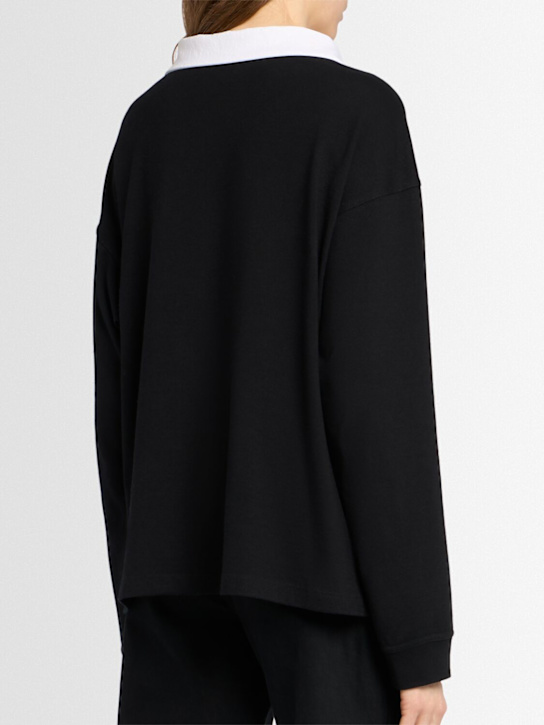 Khaite: Faithful silk jersey polo top