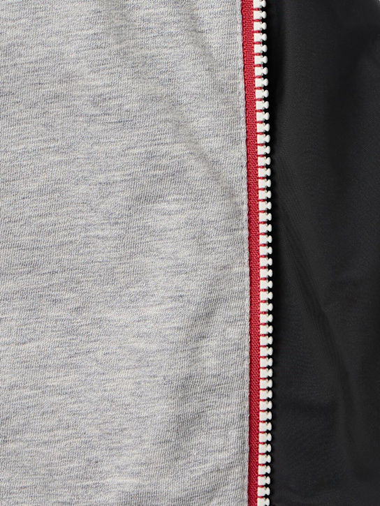 Moncler: New Urville hooded nylon rain jacket