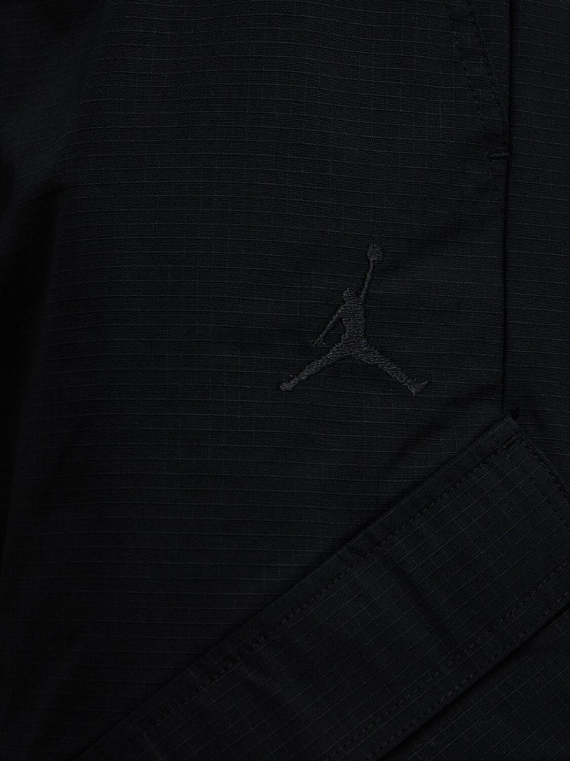 Jordan: Wide-leg trousers with side pockets