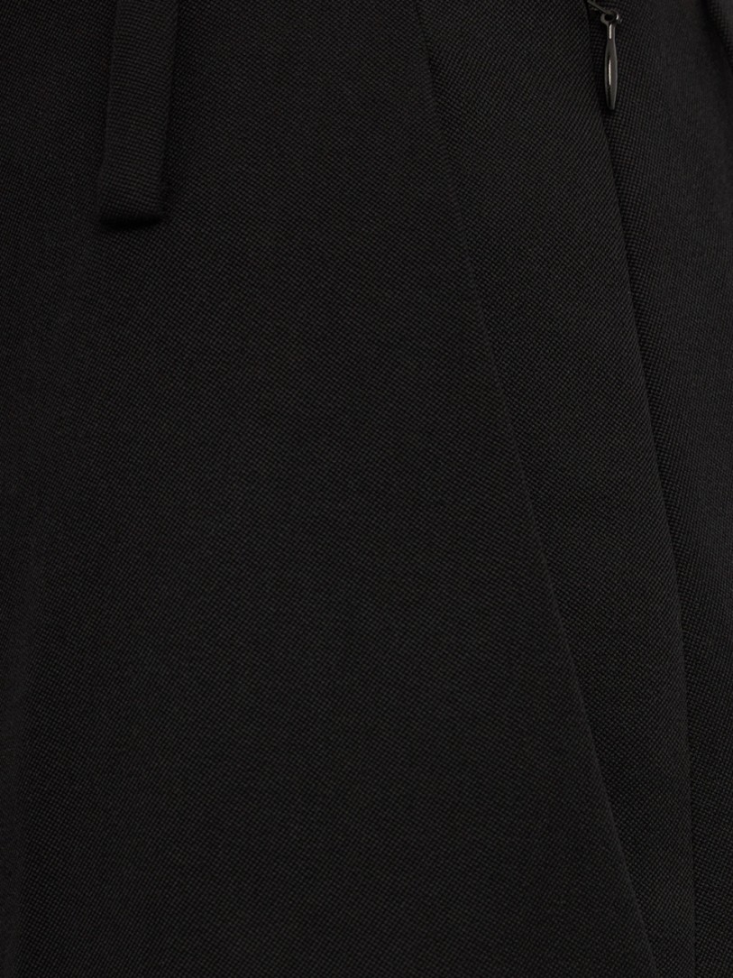 Khaite: Grenare virgin wool pleated trousers