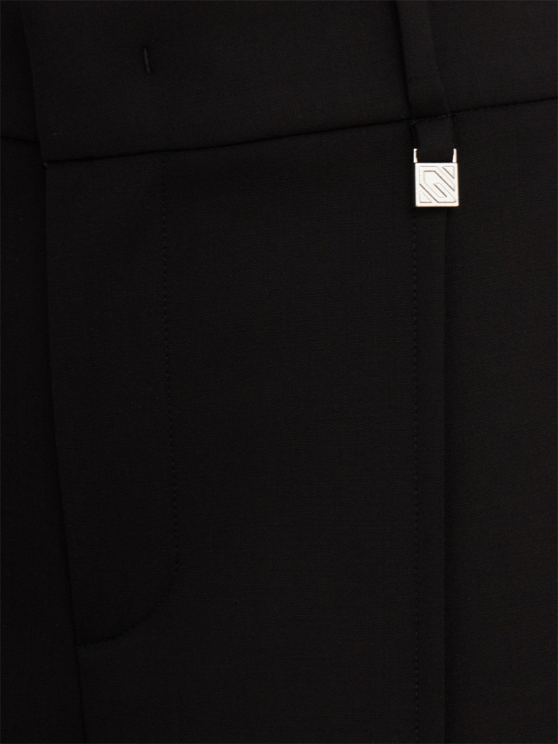 Giuseppe Di Morabito: Tailored trousers with front closure