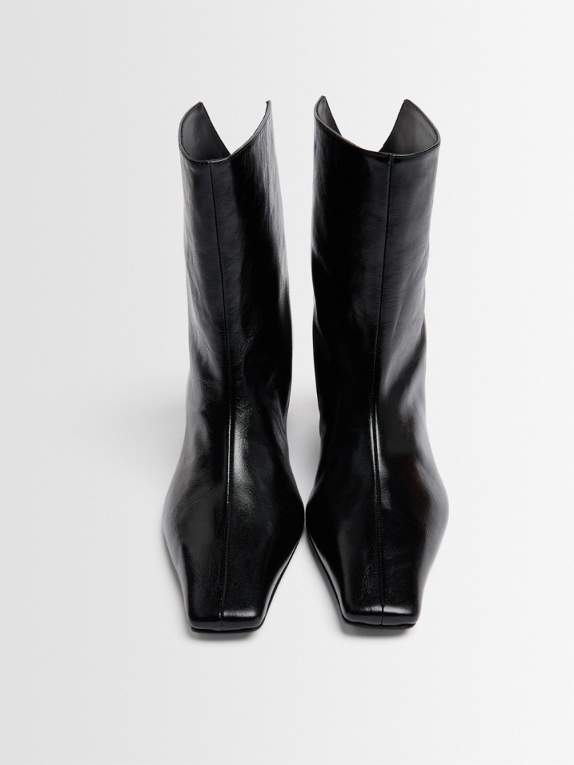Khaite: Ona glazed calf leather ankle boots