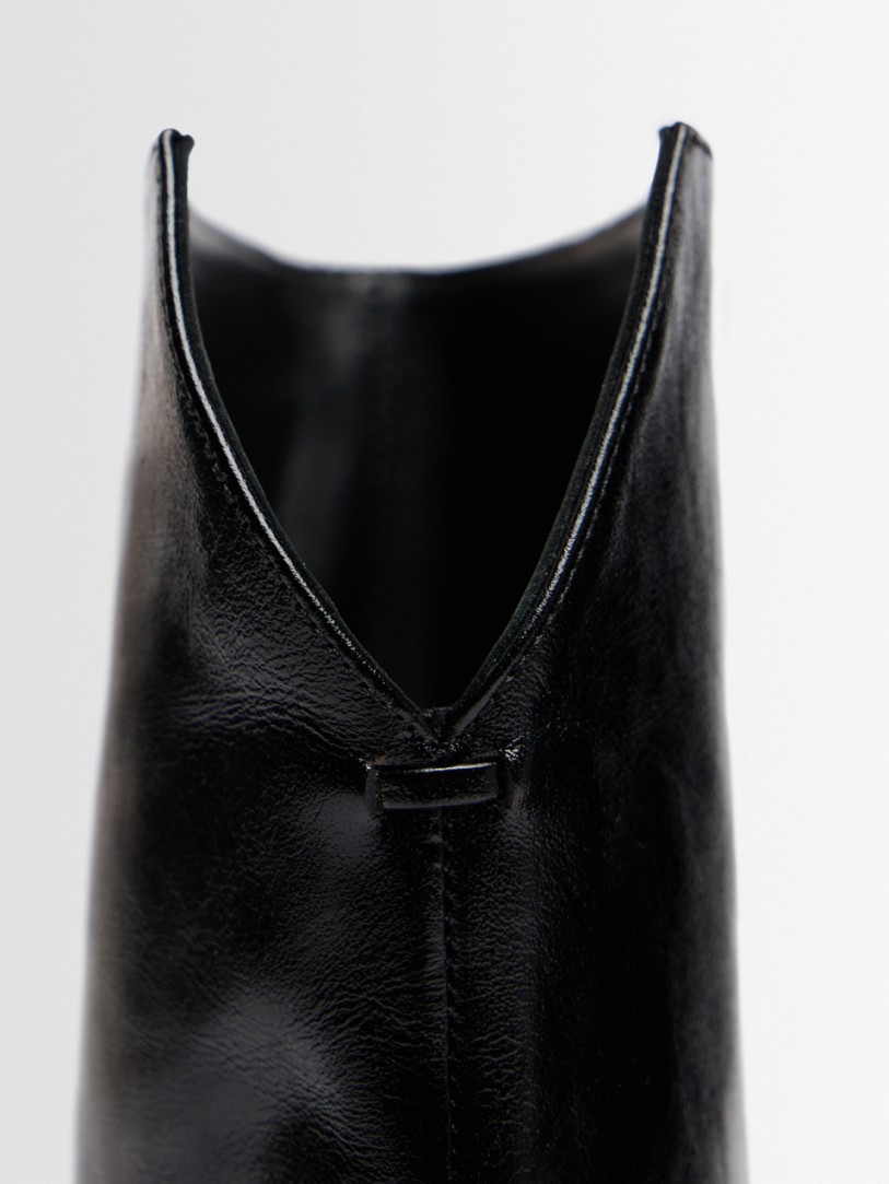 Khaite: Ona glazed calf leather ankle boots