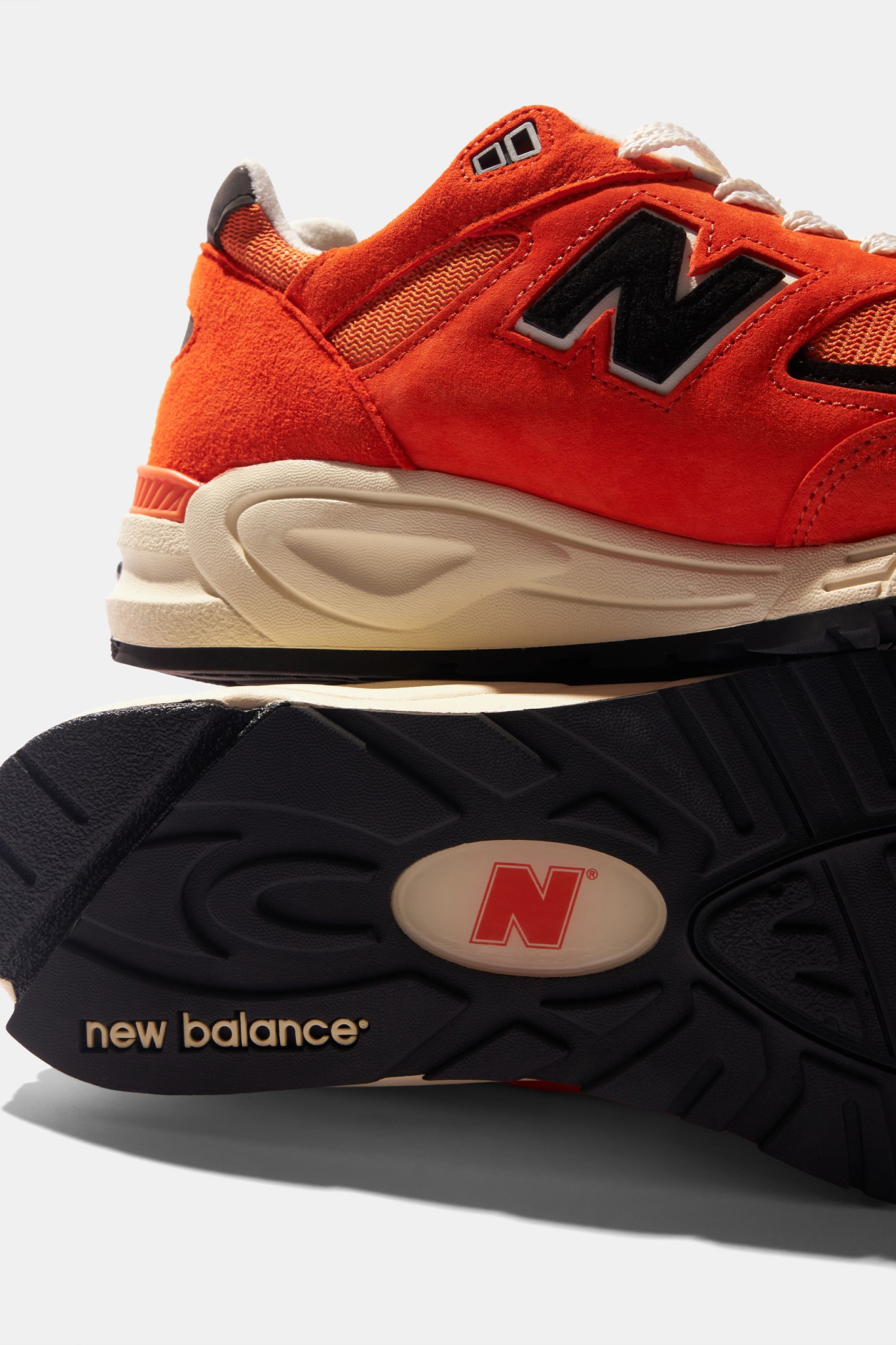 New Balance  990V1 in orange suede.
