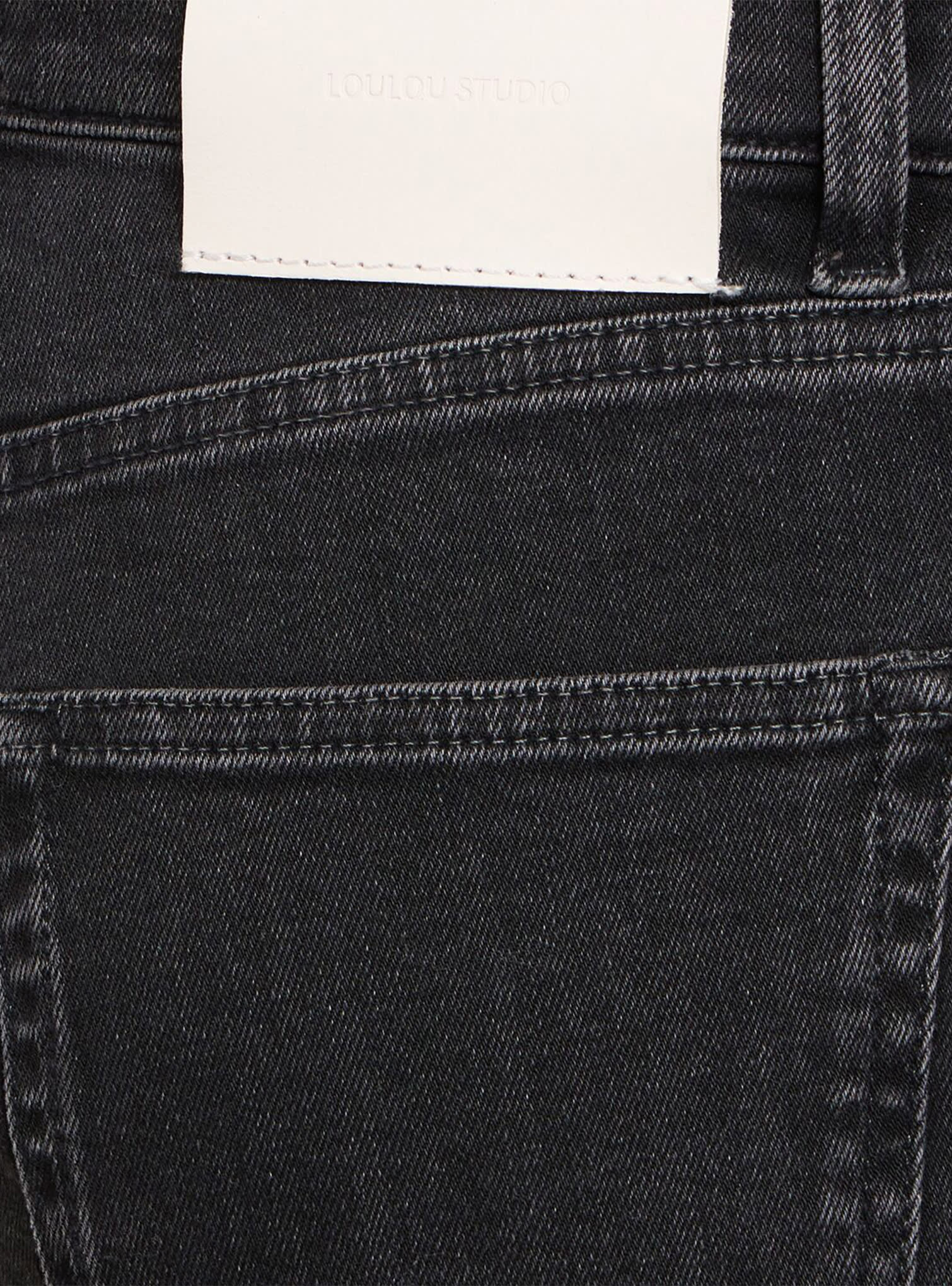 Black jeans with white label